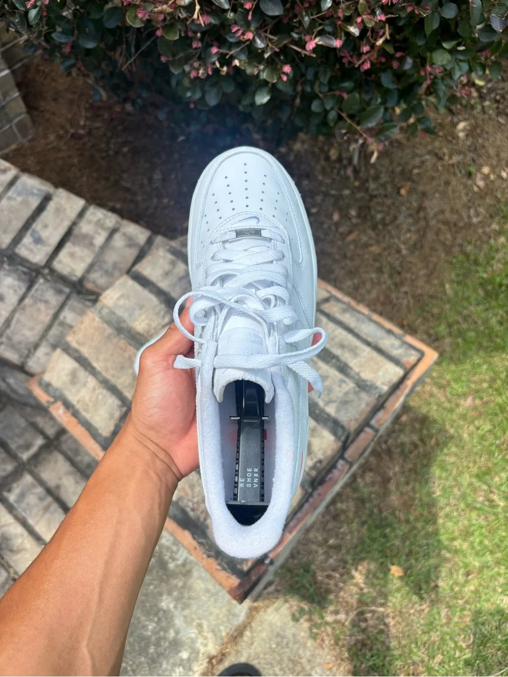 Nike White Low-Top Leather Sneaker with Red Supreme Box Logo